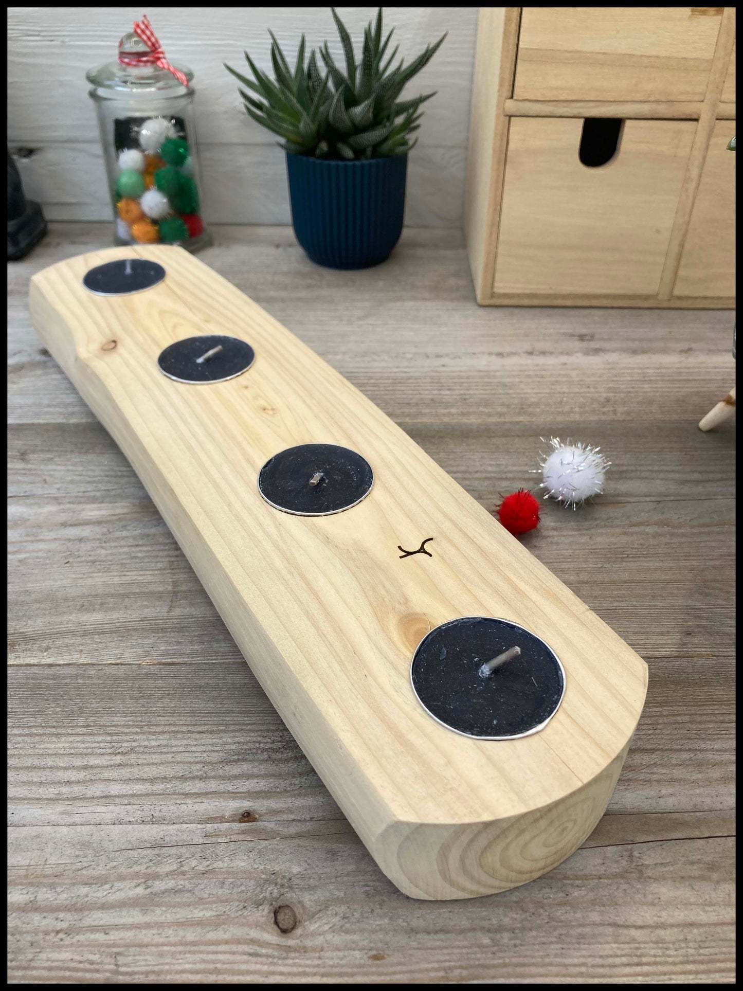 Candle holder in solid thuja wood: a quadruple Thuya candle holder