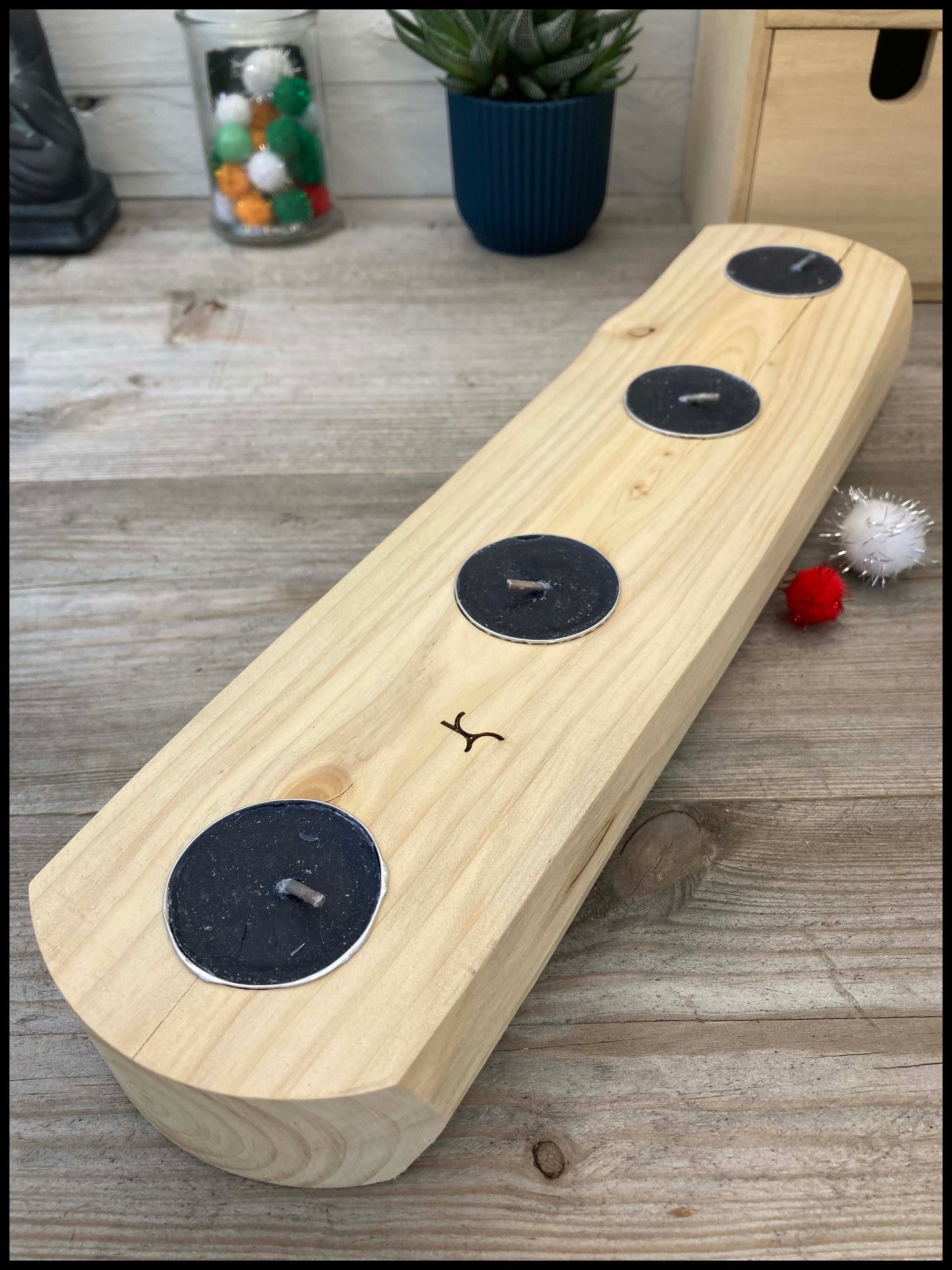Candle holder in solid thuja wood: a quadruple Thuya candle holder